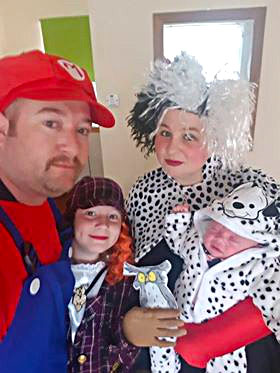 Dressed as Super Mario and Cruella De Vil