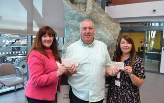 freemasons hand over charity cheque