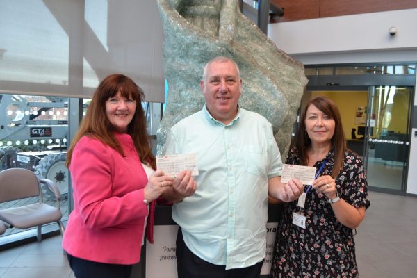 freemasons hand over charity cheque