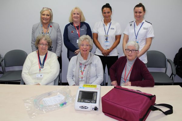 League of Friends Volunteers and Respiratory Physiotherapy Team with cough assistor