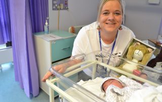 fundraising manager with firts baby born on Christmas day