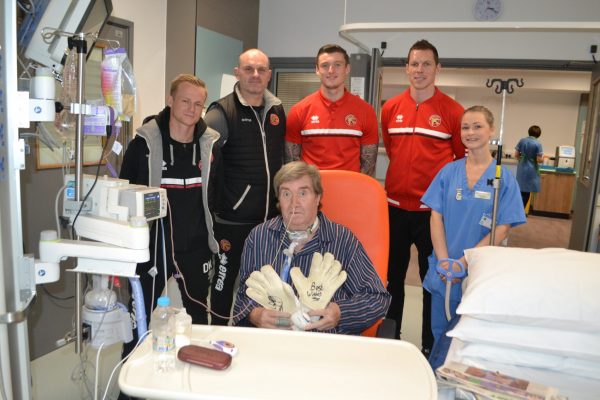 ICU patient Philip received signed goalie gloves