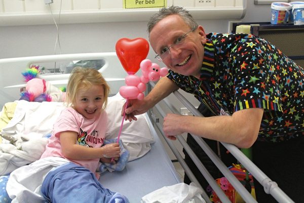 Magic Russ entertains our young patients