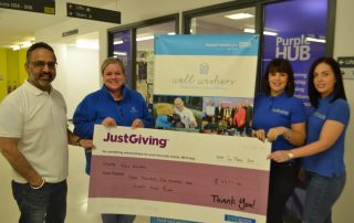 TMI hands over the charity cheque