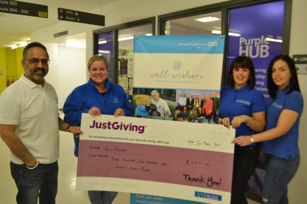 TMI hands over the charity cheque