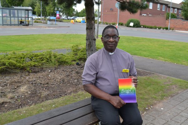 Chaplain Anthony with his book