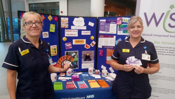 Sexual health staff on their stand
