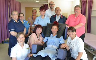 Stroke Rehab Unit staff with one of the new chairs