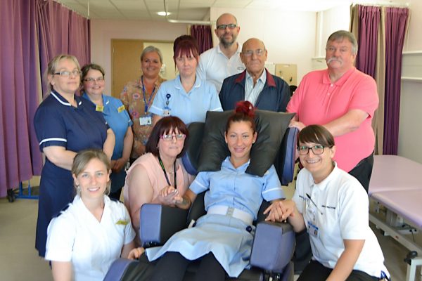 Stroke Rehab Unit staff with one of the new chairs