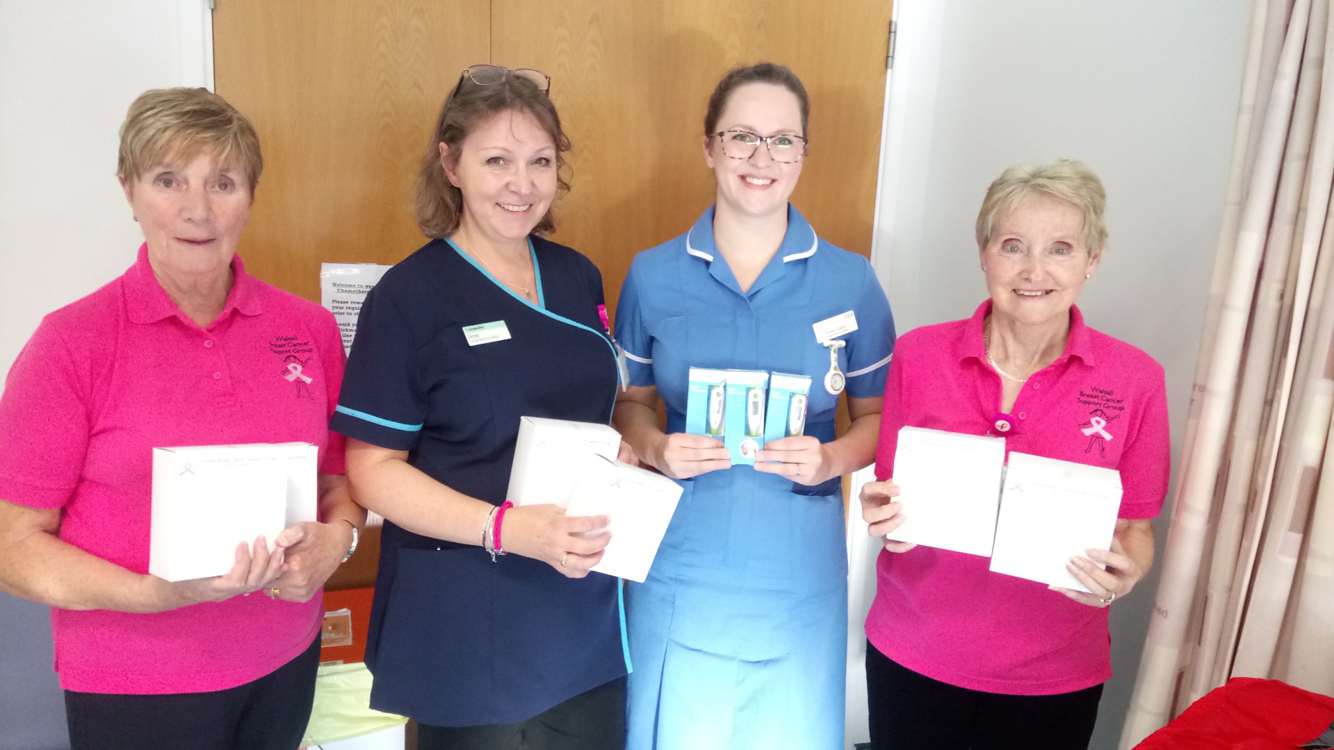 Handing over thermometers to the chemo unit