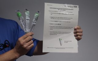 ICU staff holding swabs