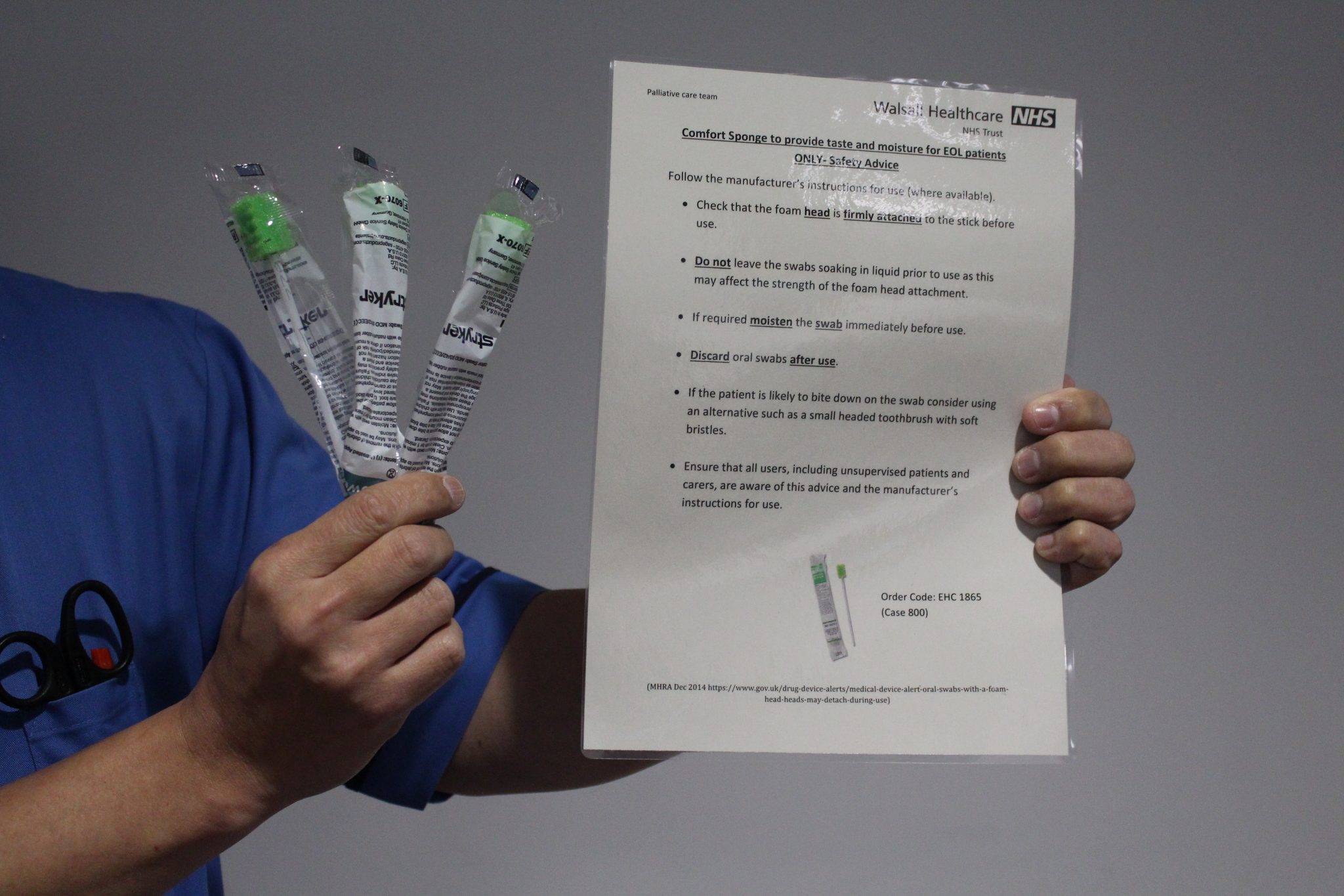 ICU staff holding swabs