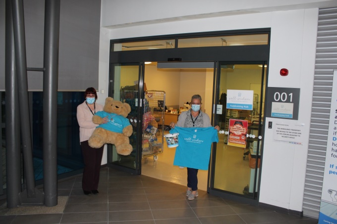 Fundraising team outside its new home