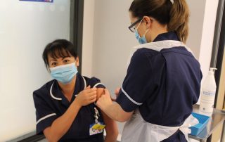 Staff receiving vaccine