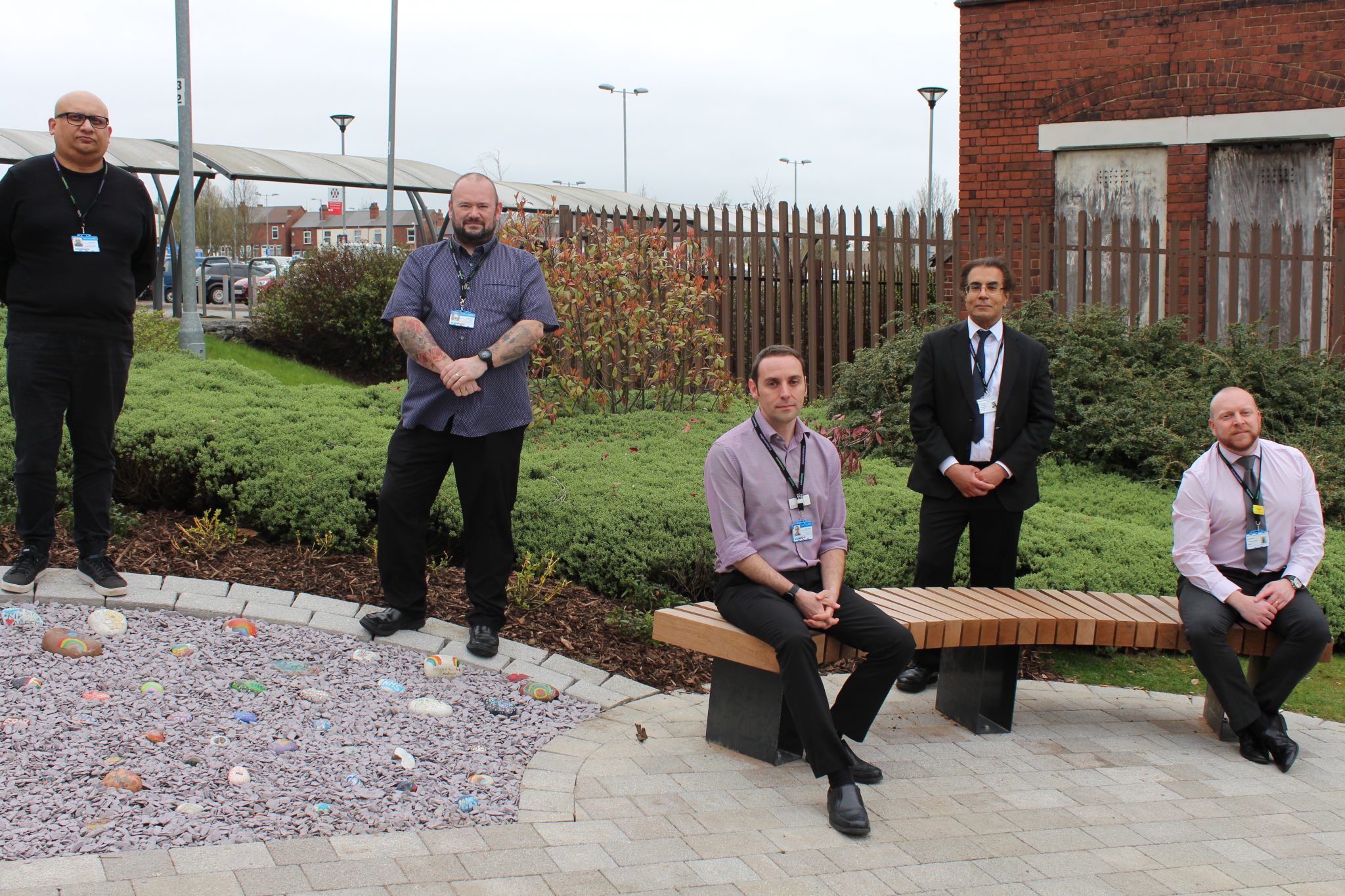Colleagues visit the special garden created for reflection