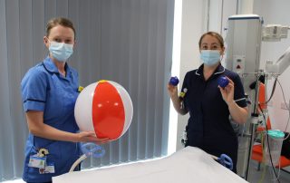 Donna and Xana with the balls used as part of rehab work
