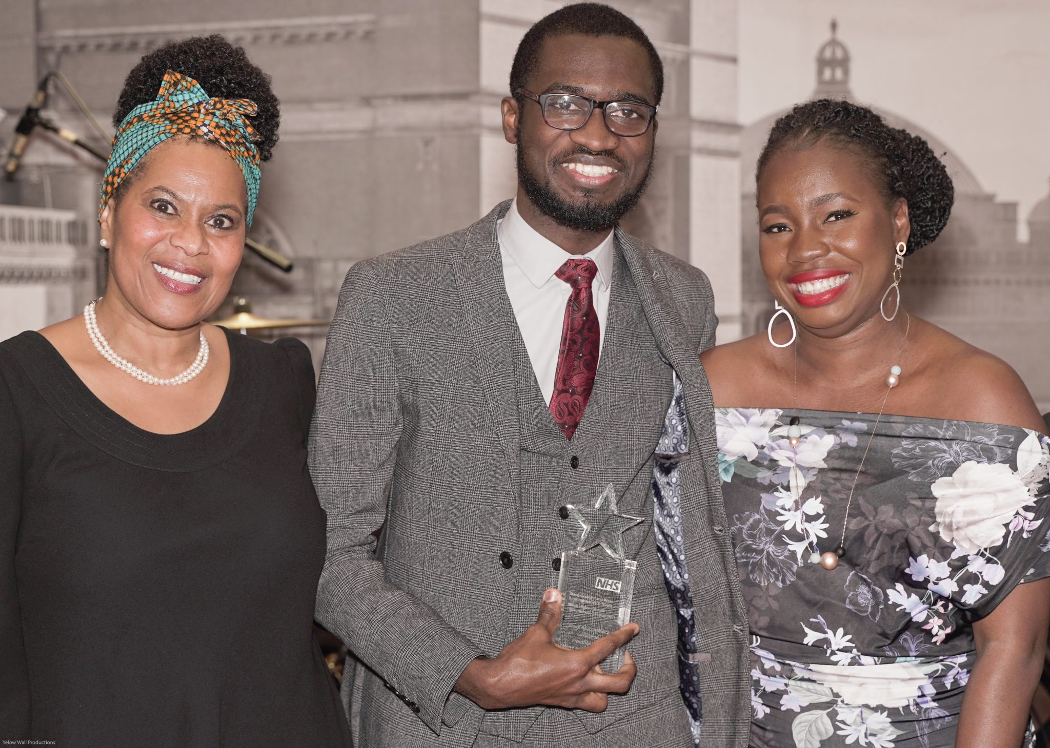 Dr Femi receives his award