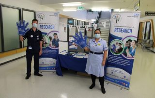 Members of the research team on their stand