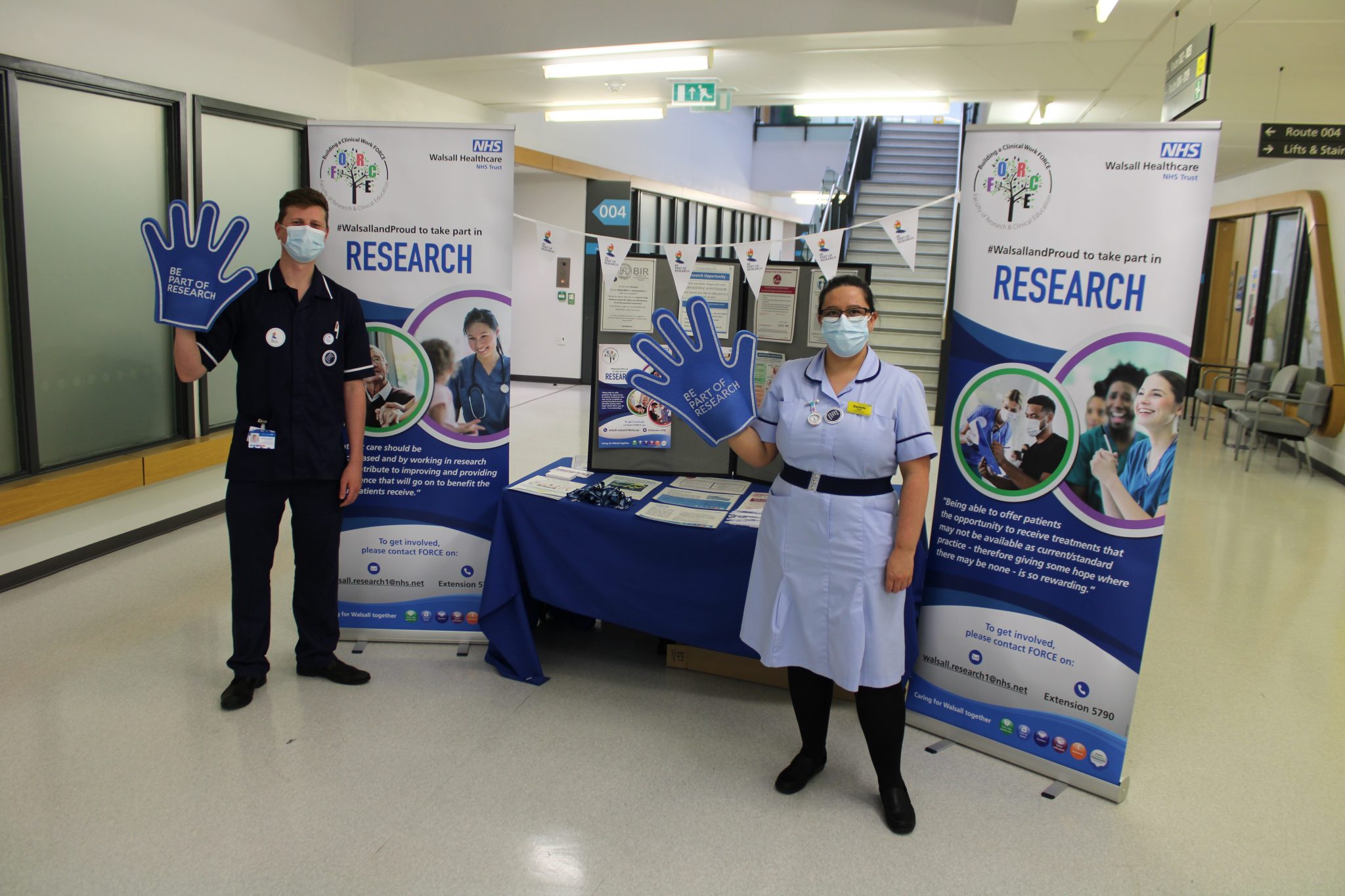 Members of the research team on their stand