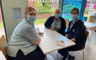 Staff enjoy their afternoon tea