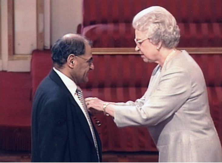 Prof Gatrad receives his OBE from the Queen