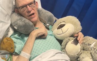 Adrian De Lacy with his teddy from Santa