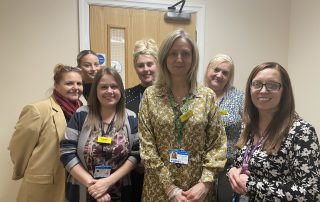 Lyndsey Allen with her colleagues as she prepares to retire
