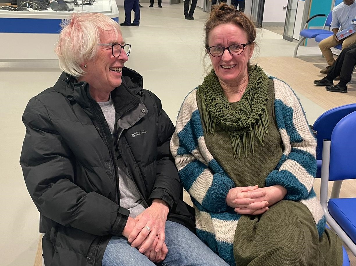 First walk-in patient John with friend Linda