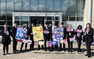 Students with their Coronation work