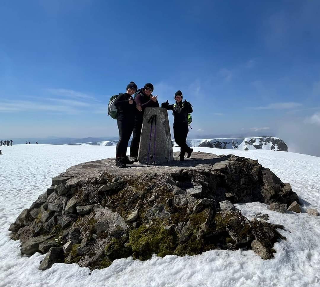 Three of the four climbers at the summit