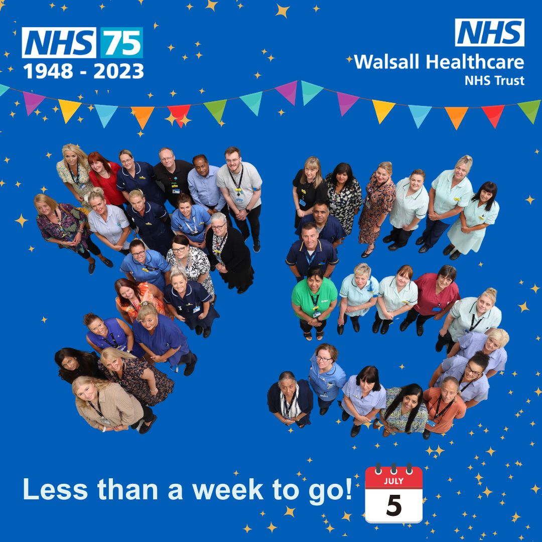 Staff form the number 75 to mark the NHS birthday