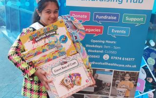 Lilly-Mae with some of the craft items she brought into hospital