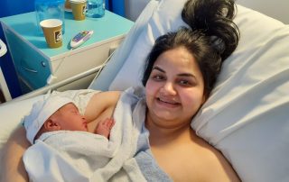 Navdeep Kaur and her new baby daughter, the first baby born in Walsall in 2024