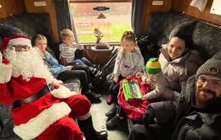 Freddie Smith and family meet Santa on the Christmas Santa Train.