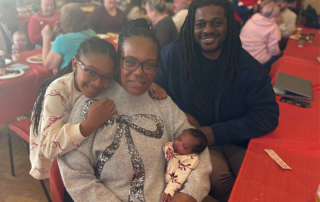 Parents Jenna Kerr and Marvin Collins with baby daughter Mya and daughter Freya.