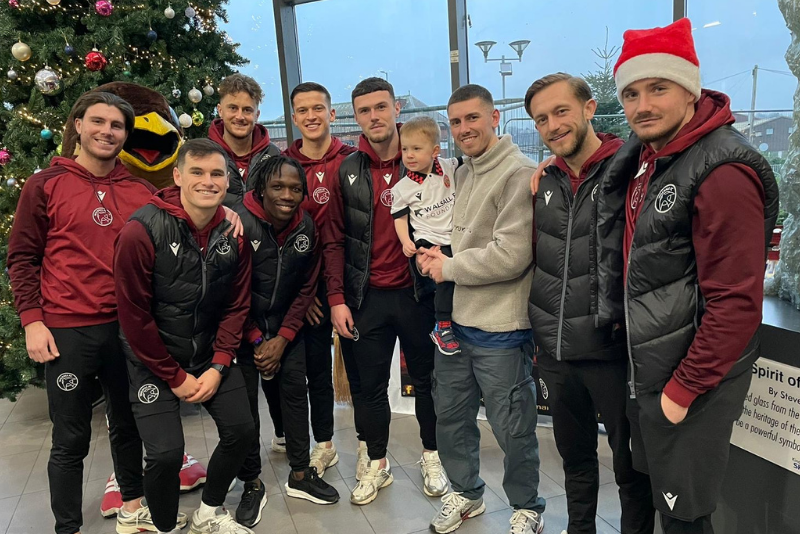 Players at Walsall Football Club visit staff at Walsall Manor Hospital.
