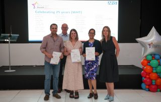 Staff receive their long service awards alongside Trust Executive Team.