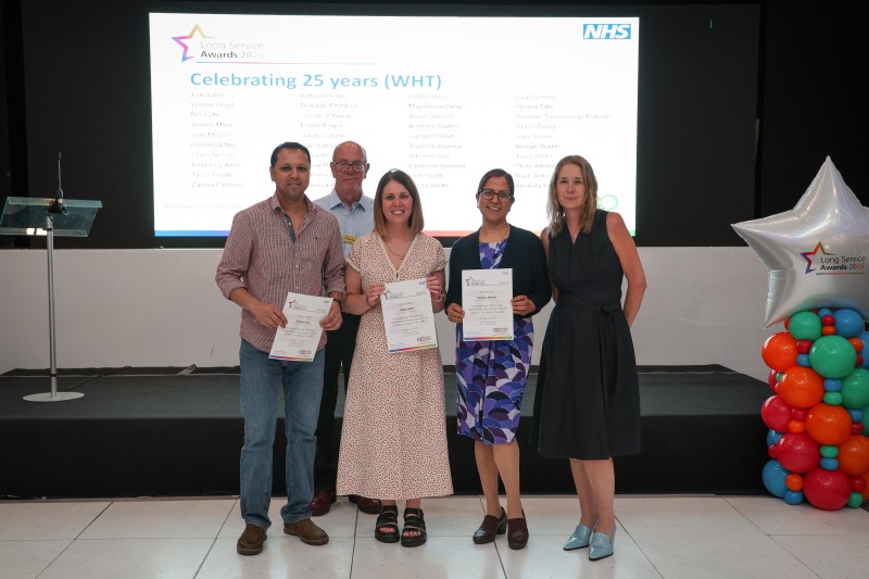 Staff receive their long service awards alongside Trust Executive Team.