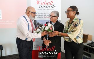 Flowers presented to Well Wishers Fundraising Team